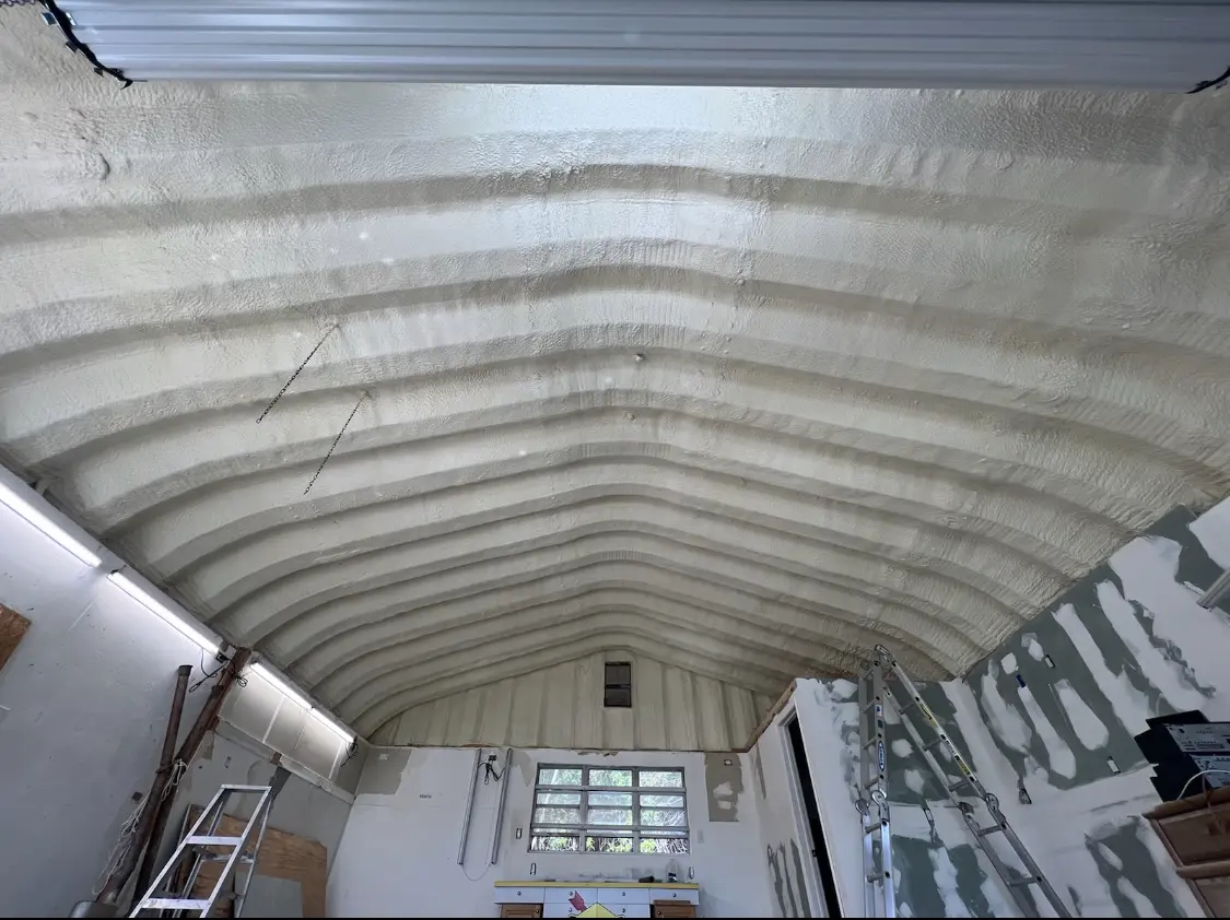 Spray polyurethane foam applied to the underside of a metal roof deck in Castle Rock